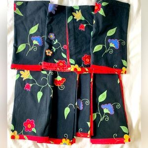 Xochi set of 8 napkins. Black floral pattern